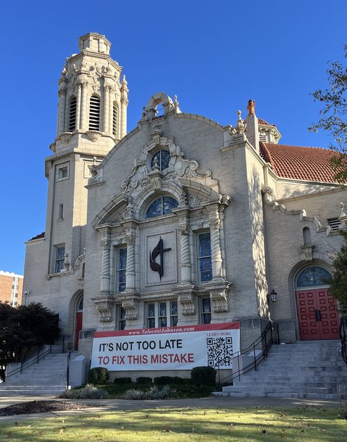 Banner emblazoned with the words “It’s Not Too Late To Fix This Mistake” hung at the Greater Birmingham Ministries